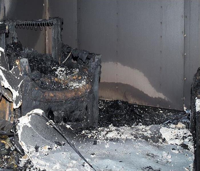 furniture in room after burned by fire